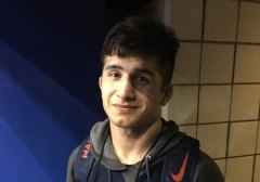 Isaiah Martinez, shown between matches, earned his third straight trip to the NCAA wrestling finals. His match will be on ESPN tonight beginning at 5 p.m.